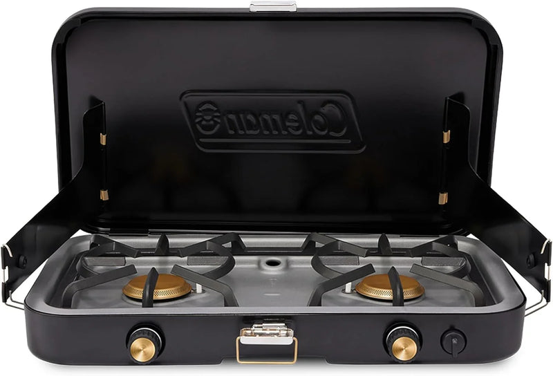 The 1900 series three-in-one propane camping stove, featuring a cast iron grill and frying pan accessories, has a power output of 24000 watts. It is equipped with an adjustable flame cover and excellent lighting device, and comes with two adjustable P7457